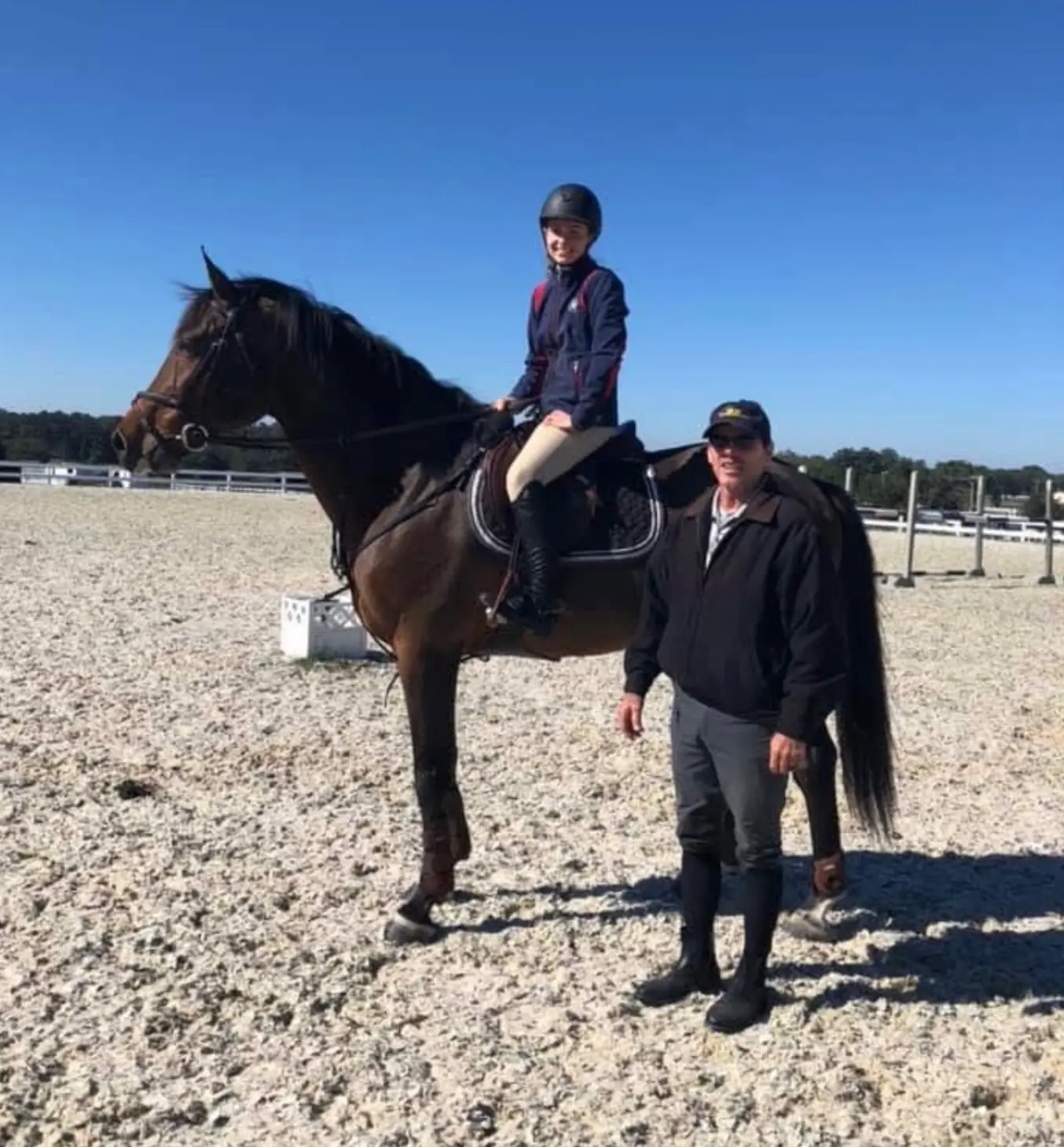 Sophia mounted alongside her longtime trainer in the ring
